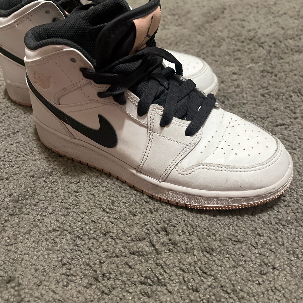 Nike Air Jordan W6.5 and Black High-Top Sneakers